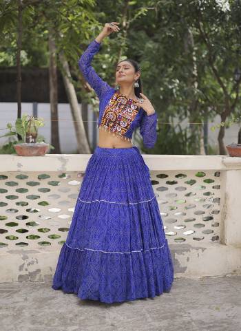 Looking These Beautiful Looking Navratri Wear Free Size Stitched Lahenga With Choli.These Lahenga Are Faux Georgette And Blouse is Fabricated On Faux Georgette.Its Beautified With Designer Bandhej Printed With Kutchi Gamthi Embroidery Work.