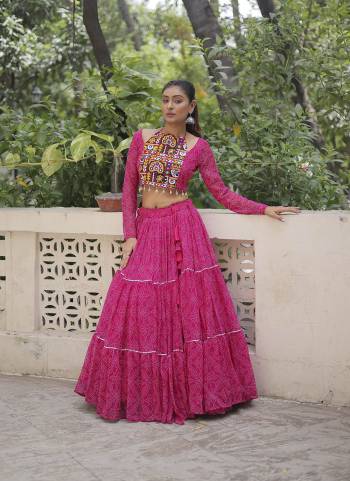 Looking These Beautiful Looking Navratri Wear Free Size Stitched Lahenga With Choli.These Lahenga Are Faux Georgette And Blouse is Fabricated On Faux Georgette.Its Beautified With Designer Bandhej Printed With Kutchi Gamthi Embroidery Work.