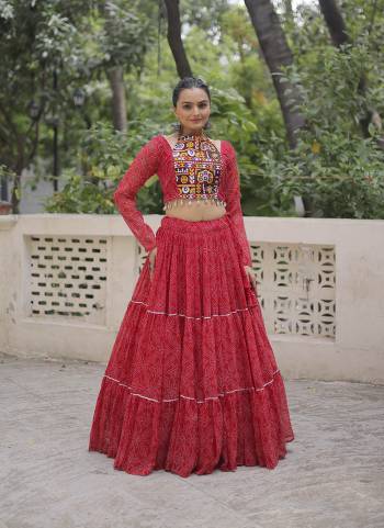 Looking These Beautiful Looking Navratri Wear Free Size Stitched Lahenga With Choli.These Lahenga Are Faux Georgette And Blouse is Fabricated On Faux Georgette.Its Beautified With Designer Bandhej Printed With Kutchi Gamthi Embroidery Work.