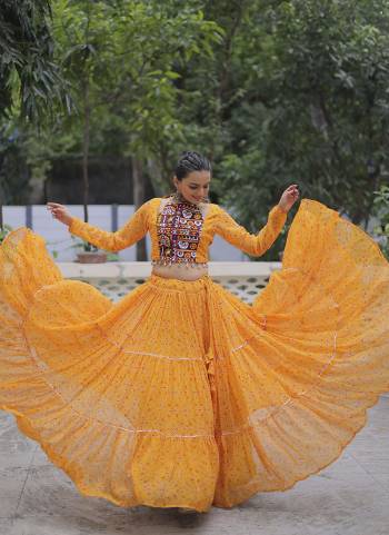 Looking These Beautiful Looking Navratri Wear Free Size Stitched Lahenga With Choli.These Lahenga Are Faux Georgette And Blouse is Fabricated On Faux Georgette.Its Beautified With Designer Bandhej Printed With Kutchi Gamthi Embroidery Work.