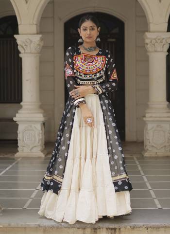 Looking These Navratri Special Lehenga Kurti in Fine Colored. These Lehenga Are Kora Cotton And Kurti Are Fabricated On Faux Georgette Fabriced. It is Beautified With Designer Bandhani Printed With Traditional Kutchi Patch Work.