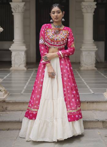 Looking These Navratri Special Lehenga Kurti in Fine Colored. These Lehenga Are Kora Cotton And Kurti Are Fabricated On Faux Georgette Fabriced. It is Beautified With Designer Bandhani Printed With Traditional Kutchi Patch Work.