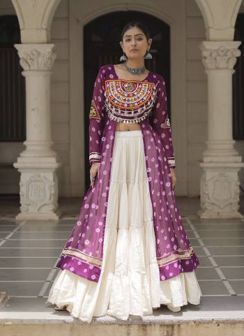 Looking These Navratri Special Lehenga Kurti in Fine Colored. These Lehenga Are Kora Cotton And Kurti Are Fabricated On Faux Georgette Fabriced. It is Beautified With Designer Bandhani Printed With Traditional Kutchi Patch Work.