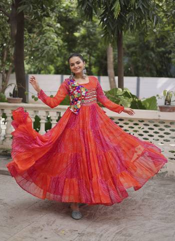 Garb These Beautiful Navratri Wear Readymade Long Gown.These Gown is Fabricated On Faux Georgette.Its Beautified With Bandhej Printed With Kutchi Gamthi Patch Embroidery Work.