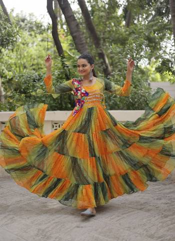 Garb These Beautiful Navratri Wear Readymade Long Gown.These Gown is Fabricated On Faux Georgette.Its Beautified With Bandhej Printed With Kutchi Gamthi Patch Embroidery Work.