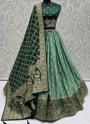 For A Fancy Designer Look,Grab These Lehenga Choli With Dupatta in Fine Colored.These Lehenga And Choli Are Satin Georgette And Dupatta Are Fabricated On Satin Georgette Pair.Its Beautified With Fancy Wevon Jacquard Designer With Mirror Work. 