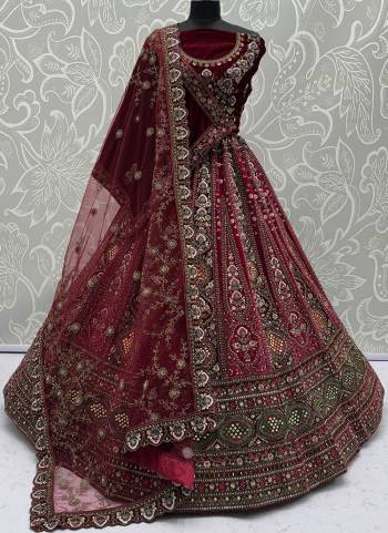 For A Fancy Designer Look,Grab These Lehenga Choli With 2 Dupatta in Fine Colored.These Lehenga And Choli Are Velvet And Dupatta Are Fabricated On Soft Net & Velvet Pair.Its Beautified With Designer Sequance,Mirrar,Jari,Multy Thread Embroidery With Zarkan Diamond Work. 