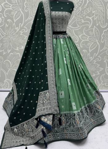 For A Fancy Designer Look,Grab These Lehenga Choli With Dupatta in Fine Colored.These Lehenga And Choli Are Georgette And Dupatta Are Fabricated On Georgette Pair.Its Beautified With Woven Jari Designer With Mirror Embroidery Work. 