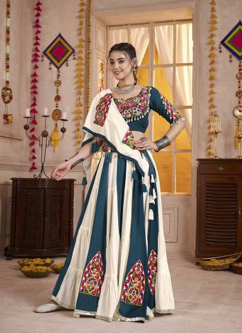 Attrective These Navratri Special Lehenga Choli in Fine Colored.These Lehenga Are Viscose Cotton And Blouse Are Viscose Cotton And Dupatta Are Fabricated On Viscose Cotton.Its Beautified With Designer Multy Thread,Mirror Embroidery,Hand Work.