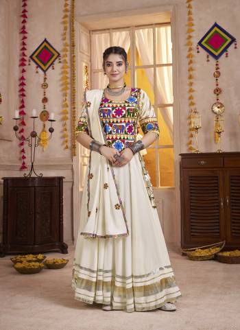 Attrective These Navratri Special Lehenga Choli in Fine Colored.These Lehenga Are Viscose Cotton And Blouse Are Viscose Cotton And Dupatta Are Fabricated On Viscose Cotton.Its Beautified With Designer Multy Thread,Mirror Embroidery,Hand Work.