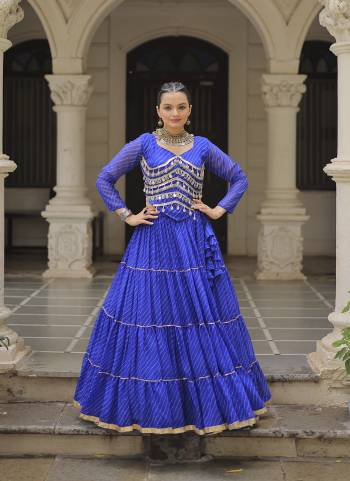 Attractive These Navratri Special Lehenga Choli in Fine Colored. These Lehenga Are Faux Georgette And Blouse Are Fabricated On Faux Georgette Fabriced. It is Beautified With Lahariya Printed Designer With Mirror Lace Work.