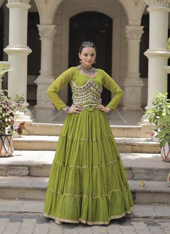Attractive These Navratri Special Lehenga Choli in Fine Colored. These Lehenga Are Faux Georgette And Blouse Are Fabricated On Faux Georgette Fabriced. It is Beautified With Lahariya Printed Designer With Mirror Lace Work.