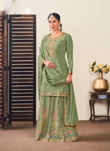 Attrective Looking These Gharara Suit in Fine Colored Pair With Bottom And Dupatta.These Top And Dupatta Are Fabricated On Chinon Pair With Chinon Bottom.Its Beautified With Designer Multy Thread,Jari Embroidery Work.