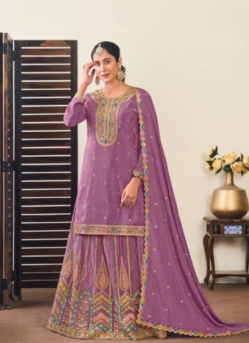 Attrective Looking These Gharara Suit in Fine Colored Pair With Bottom And Dupatta.These Top And Dupatta Are Fabricated On Chinon Pair With Chinon Bottom.Its Beautified With Designer Multy Thread,Jari Embroidery Work.
