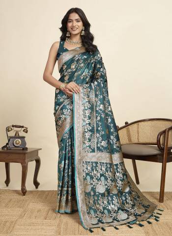Looking This Party Wear Two Tone Saree Paired With Blouse.This Saree And Blouse Are Two Tone Satin Silk Fabric With Wevon Jari Designer. Buy This Pretty Saree Now.