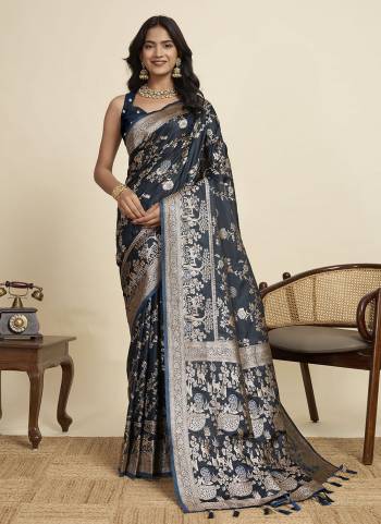 Looking This Party Wear Two Tone Saree Paired With Blouse.This Saree And Blouse Are Two Tone Satin Silk Fabric With Wevon Jari Designer. Buy This Pretty Saree Now.