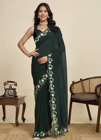Garb This Party Wear  Saree Paired With Blouse.This Saree And Blouse Are Georgette Fabricated With Designer Brush Printed With Swarovski Work. Buy This Pretty Saree Now.