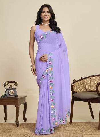 Garb This Party Wear  Saree Paired With Blouse.This Saree And Blouse Are Georgette Fabricated With Designer Brush Printed With Swarovski Work. Buy This Pretty Saree Now.