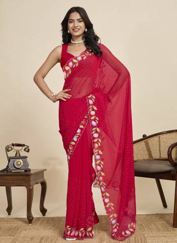 Garb This Party Wear  Saree Paired With Blouse.This Saree And Blouse Are Georgette Fabricated With Designer Brush Printed With Swarovski Work. Buy This Pretty Saree Now.