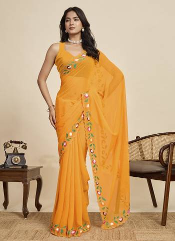 Garb This Party Wear  Saree Paired With Blouse.This Saree And Blouse Are Georgette Fabricated With Designer Brush Printed With Swarovski Work. Buy This Pretty Saree Now.
