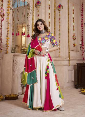 Attrective These Navratri Special Lehenga Choli in Fine Colored.These Lehenga Are Viscose Cotton And Blouse Are Viscose Cotton And Dupatta Are Fabricated On Viscose Cotton.Its Beautified With Designer Multy Thread,Mirror Embroidery,Hand Work.