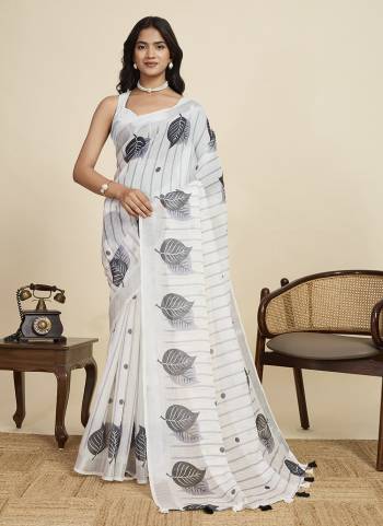Looking This Party Wear  Saree Paired With Blouse.This Saree And Blouse Are Linen Fabricated With Wevon Jari Border With Designer Digital Printed. Buy This Pretty Saree Now.