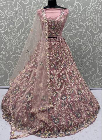 For A Fancy Designer Look,Grab These Lehenga Choli With Dupatta in Fine Colored.These Lehenga And Choli Are Net And Dupatta Are Fabricated On Net Pair.Its Beautified With  5 Color Sequance,Flower Pattern,Multy Thread Embroidery Work. 
