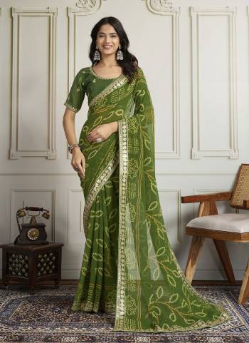 Attrective These Party Wear Saree in Fine Colored.These Saree Are Georgette And Blouse is Art Silk Fabricated.Its Beautified With Bandhani Printed With Embroidery Work Lace Border And Blouse.