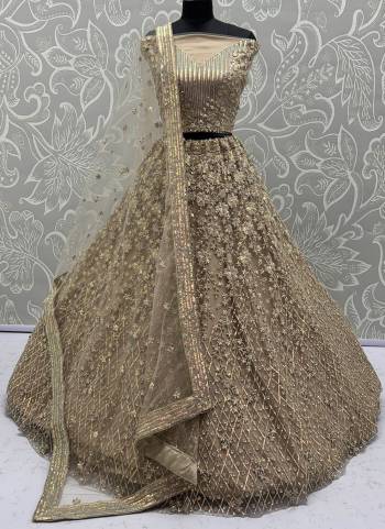 For A Fancy Designer Look,Grab These Lehenga Choli With Dupatta in Fine Colored.These Lehenga And Choli Are Net And Dupatta Are Fabricated On Net Pair.Its Beautified With  Multy Thread, Sequance,Jari Embroidery,Zarkan Work. 
