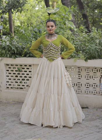 Attractive These Navratri Special Lehenga Choli in Fine Colored. These Lehenga Are Kora Cotton And Blouse Are Fabricated On Faux Georgette Fabriced. It is Beautified With Lahariya Printed Designer With Mirror Lace Work.