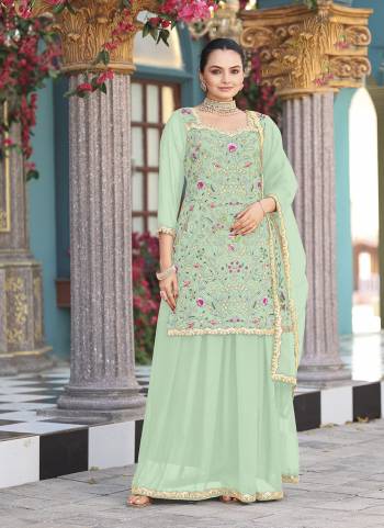 Attrective Looking These Party Wear Plazzo Skirt Suit in Fine Colored Pair With Bottom And Dupatta.These Top Are Georgette And Dupatta Are Fabricated On Net Pair With Georgette Bottom.Its Beautified With Designer Heavy Embroidery Work.