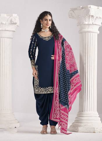 Looking These Beautiful Party Wear Fine Color Salwar Suits.These Top Are Roman Silk And Dupatta Are Chanderi Silk And Bottom Santoon Fabricated.Its Beautified With Designer Embroidery Work With Printed Dupatta.