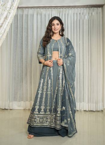 Attrective These Party Wear Skirt Suit in Fine Colored Pair With Bottom And Dupatta.These Top Are Georgette And Dupatta Are Fabricated On Georgette Pair With Georgette Bottom.Its Beautified With Designer Heavy Embroidery Work.