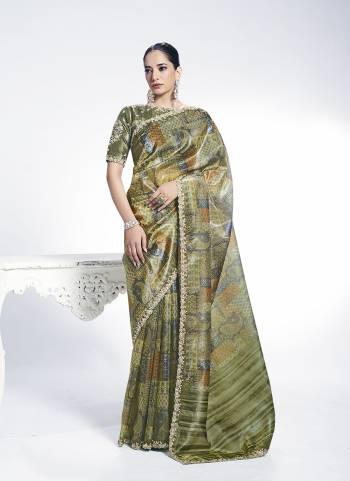 Look Attractive These Designer Party Wear Saree in Fine Colored.These Saree Are Two Tone Paper Silk And Blouse Two Tone Paper Silk is Fabricated.Its Beautified Embroidery With Stone Hand  Work Desiger With Digital Printed.