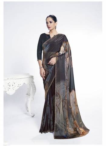 Look Attractive These Designer Party Wear Saree in Fine Colored.These Saree Are Two Tone Satin Silk And Blouse Silk Jacquard is Fabricated.Its Beautified Swarovski Stone Work Designer With Digital Printed.
