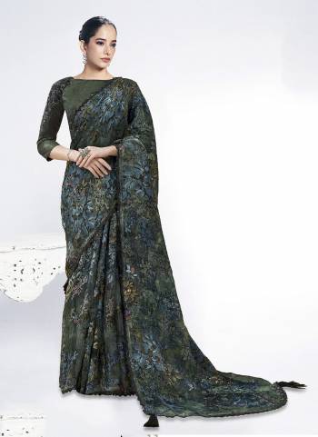 Look Attractive These Designer Party Wear Saree in Fine Colored.These Saree Are Brosso And Blouse Raw Silk is Fabricated.Its Beautified Embroidery With Stone Hand  Work Desiger With Digital Printed.