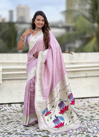 Attractive These Party Wear Saree in Fine Colored.These Saree And Blouse is Fabricated On Paithani Silk.Its Beautified With Weaving Silver Jari, Meenakari Peacock Designer.