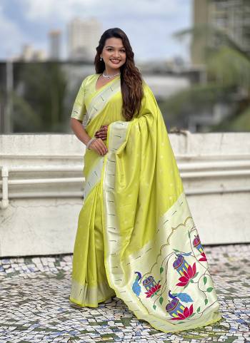 Attractive These Party Wear Saree in Fine Colored.These Saree And Blouse is Fabricated On Paithani Silk.Its Beautified With Weaving Silver Jari, Meenakari Peacock Designer.