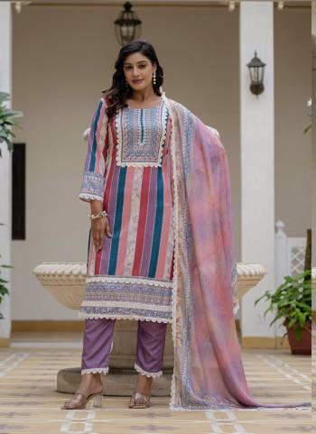 Looking These Suit in Fine Colored Pair With Bottom And Dupatta.These Top Are Rayon Slub And Bottom Are Fabricated On Rayon Slub Pair With Chinon Dupatta.Its Beautified With Designer Printed With Embroidery Work.