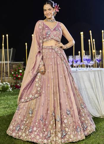 For A Fancy Designer Look,Grab These Lehenga Choli With Dupatta in Fine Colored.These Lehenga And Choli Are Tissue And Dupatta Are Fabricated On Tissue Pair.Its Beautified With Fancy Heavy Designer Embroidery Work. 