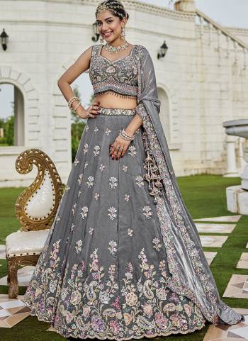 For A Fancy Designer Look,Grab These Lehenga Choli With Dupatta in Fine Colored.These Lehenga And Choli Are Tissue And Dupatta Are Fabricated On Tissue Pair.Its Beautified With Fancy Heavy Designer Embroidery Work. 
