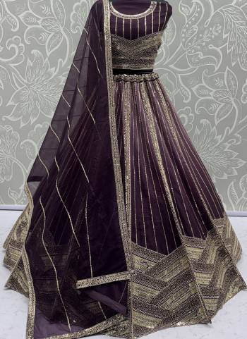 For A Fancy Designer Look,Grab These Lehenga Choli With Dupatta in Fine Colored.These Lehenga And Choli Are Bridal Net And Dupatta Are Fabricated On Soft Net Pair.Its Beautified With  Multy Thread, Sequance,Jari Embroidery,Crystal Pipe,Hand Work. 