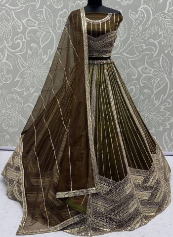 For A Fancy Designer Look,Grab These Lehenga Choli With Dupatta in Fine Colored.These Lehenga And Choli Are Bridal Net And Dupatta Are Fabricated On Soft Net Pair.Its Beautified With  Multy Thread, Sequance,Jari Embroidery,Crystal Pipe,Hand Work. 