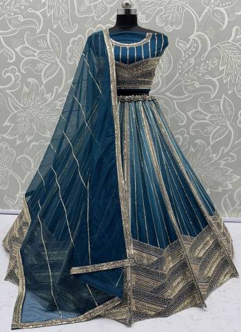 For A Fancy Designer Look,Grab These Lehenga Choli With Dupatta in Fine Colored.These Lehenga And Choli Are Bridal Net And Dupatta Are Fabricated On Soft Net Pair.Its Beautified With  Multy Thread, Sequance,Jari Embroidery,Crystal Pipe,Hand Work. 