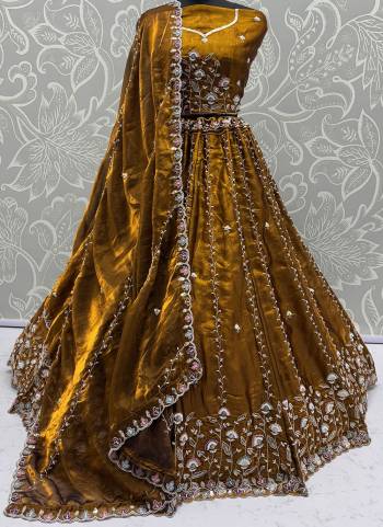 For A Fancy Designer Look,Grab These Lehenga Choli With Dupatta in Fine Colored.These Lehenga And Choli Are Satin Silk And Dupatta Are Fabricated On Satin Silk Pair.Its Beautified With  Multy Thread, Sequance,Jari Embroidery,Crystal Pipe,Hand Work. 