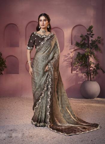 Look Attrective These Designer Party Wear Saree in Fine Colored.These Saree Are Two Tone Satin Silk And Blouse Satin Silk is Fabricated.Its Beautified Desiger Printed With Embroidery,Stone Work.