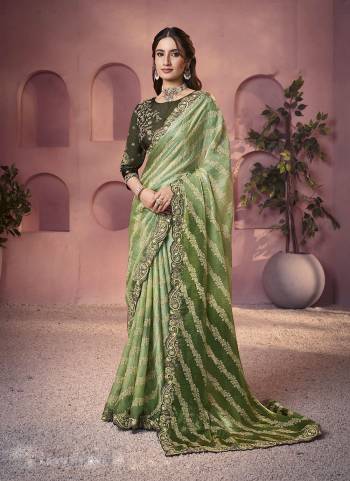 Look Attrective These Designer Party Wear Saree in Fine Colored.These Saree Are Two Tone Satin Silk And Blouse Satin Silk is Fabricated.Its Beautified Desiger Printed With Embroidery,Stone Work.