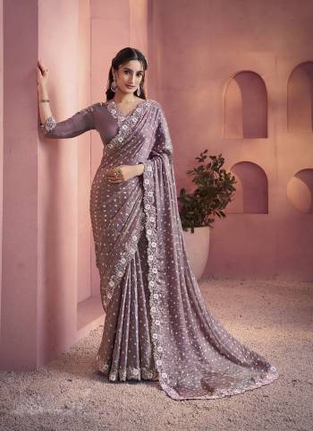 Look Attrective These Designer Party Wear Saree in Fine Colored.These Saree Are Two Tone Satin Silk And Blouse Satin Silk is Fabricated.Its Beautified Desiger Printed With Embroidery,Stone Work.