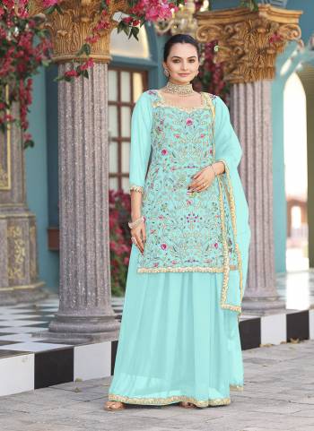 Attrective Looking These Party Wear Skirt Suit in Fine Colored Pair With Bottom And Dupatta.These Top Are Georgette And Dupatta Are Fabricated On Net Pair With Georgette Bottom.Its Beautified With Designer Heavy Multy Thread Embroidery Work.