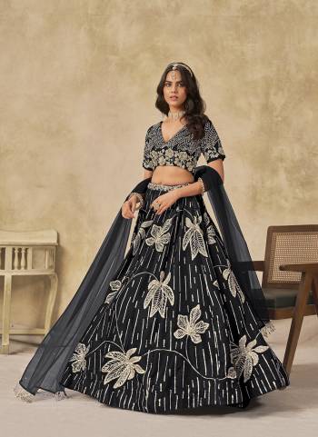 For A Designer Look,Grab These Party Wear Lehenga Choli in Fine Colored.These Lehenga And Blouse Are Fabricated On Art Silk Pair With Art Silk Dupatta.Its Beautified With Designer Sequance Embroidery Work.